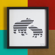 Load image into Gallery viewer, Two bears with zig zag pattern in a black frame
