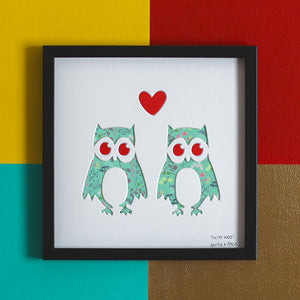 Owl artwork with heart detail and green floral pattern