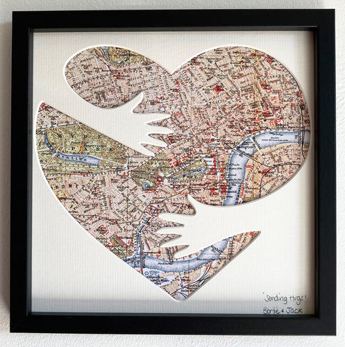 Heart shaped artwork with a map